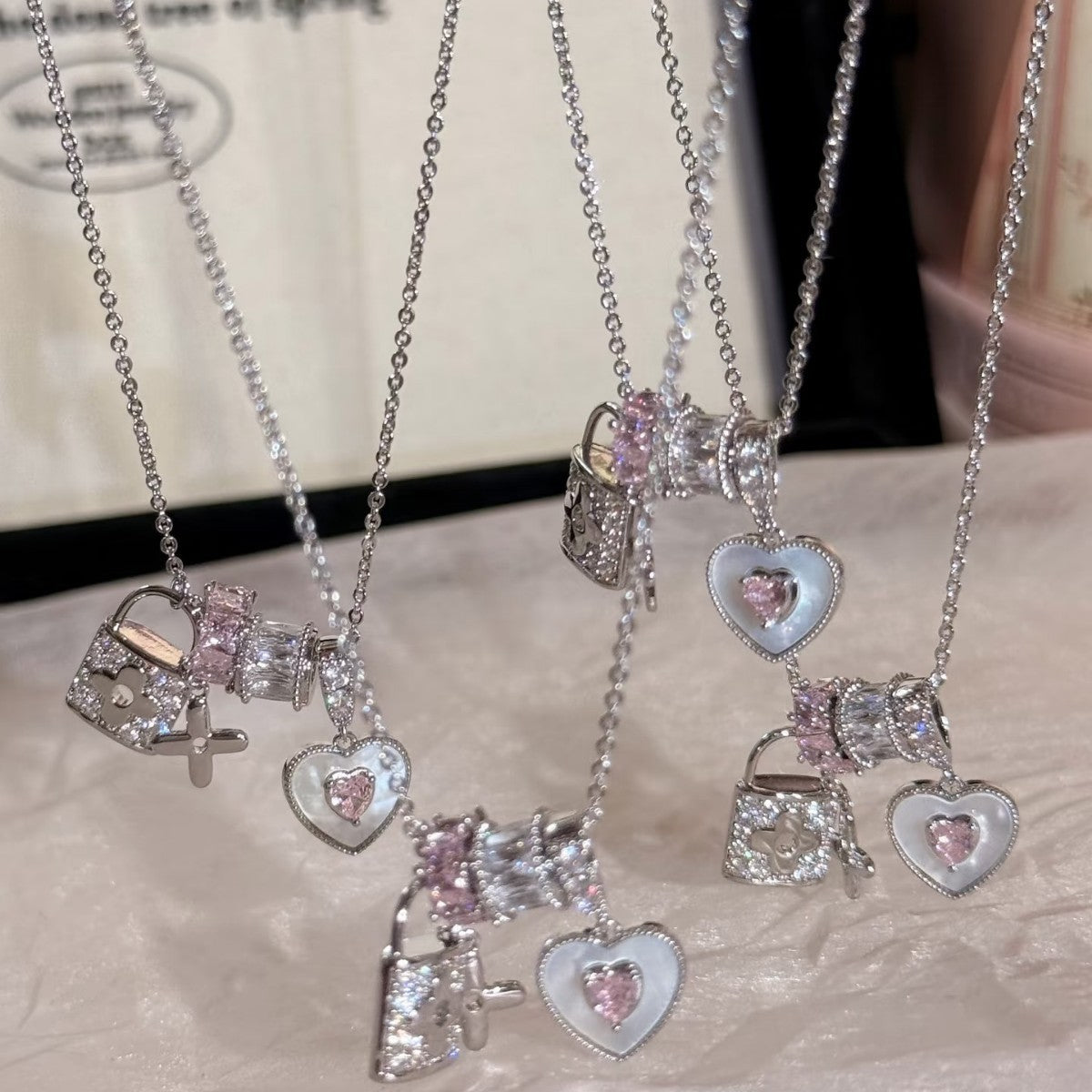 「Charmed Devotion」Multi-Charm Pavé Necklace